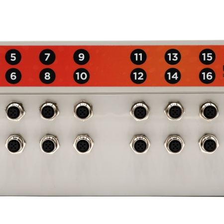 Front panel of an industrial I/O unit showing 16 round DIN ports on two rows, a red 'Serial Port Map' label, and a power switch.